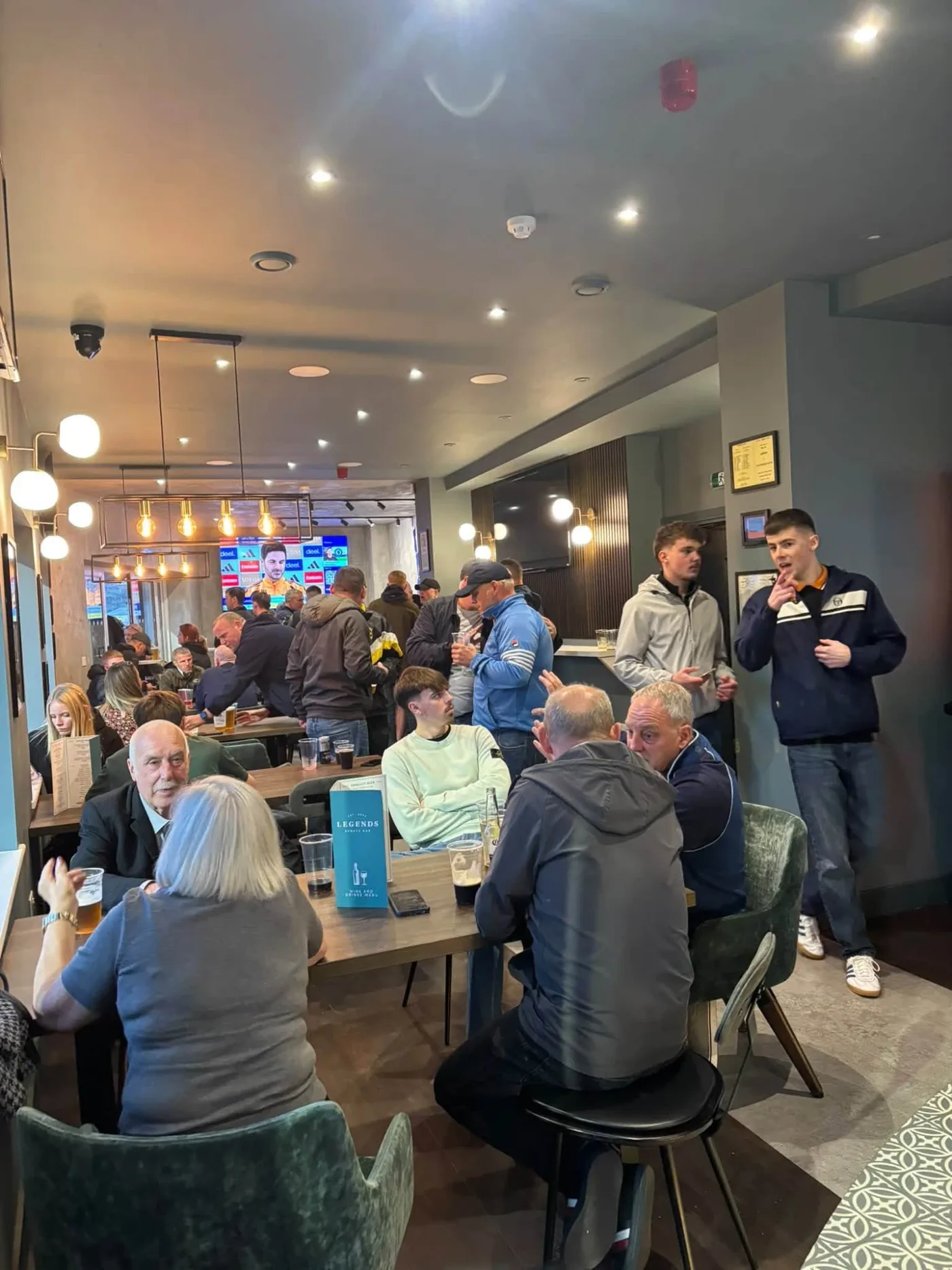 Away supporters filling the Legends Sports Bar before a game